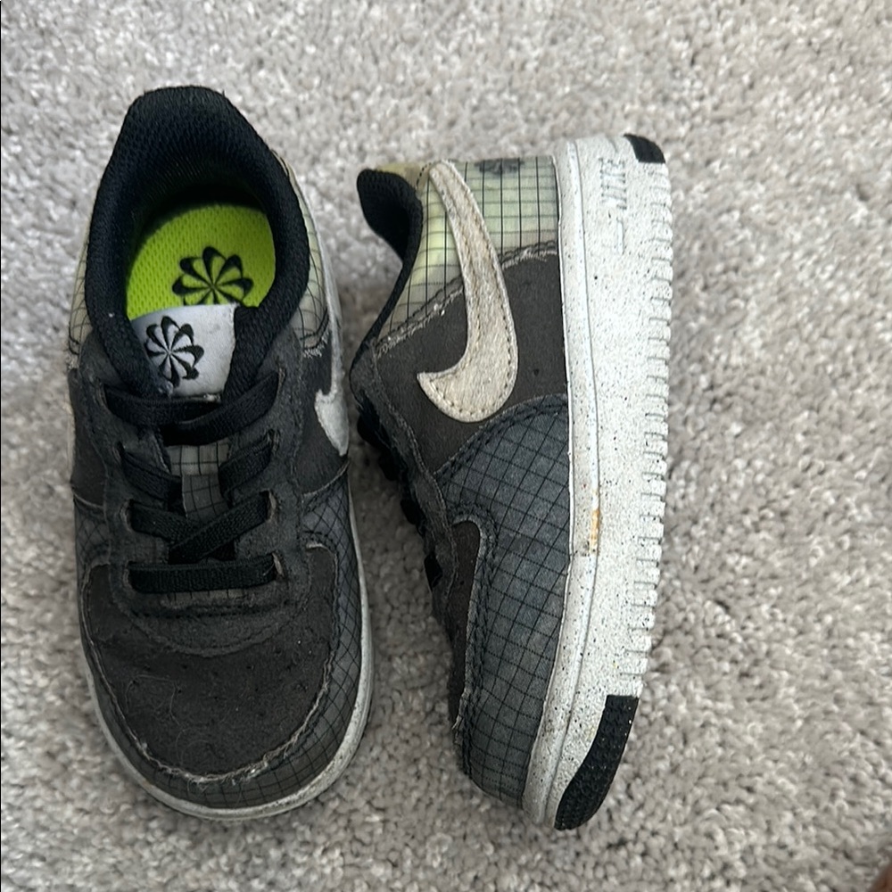 Kids Black and White Nike Shoes